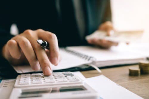 a person using a calculator