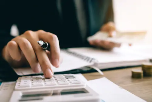 a person using a calculator