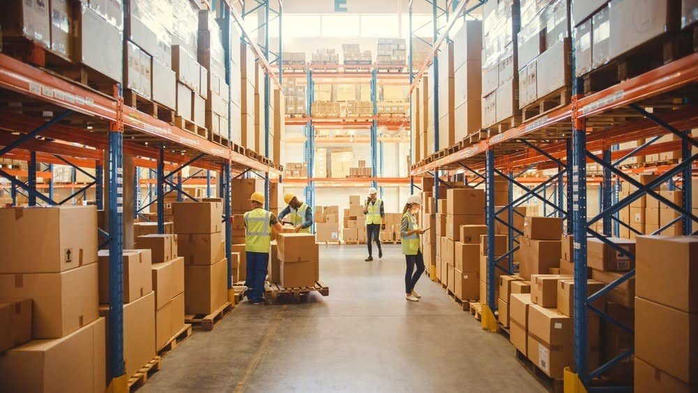 a group of people in a warehouse