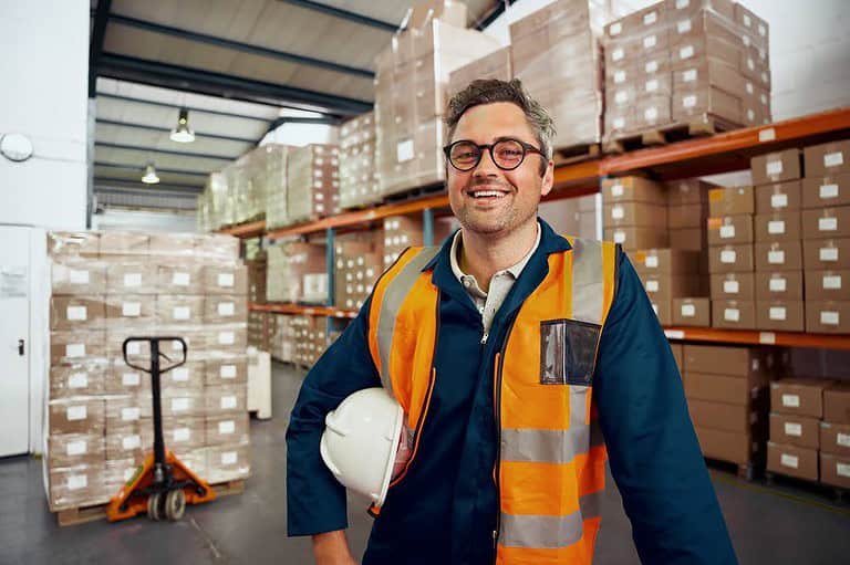 gentleman happy about creating a lean warehouse